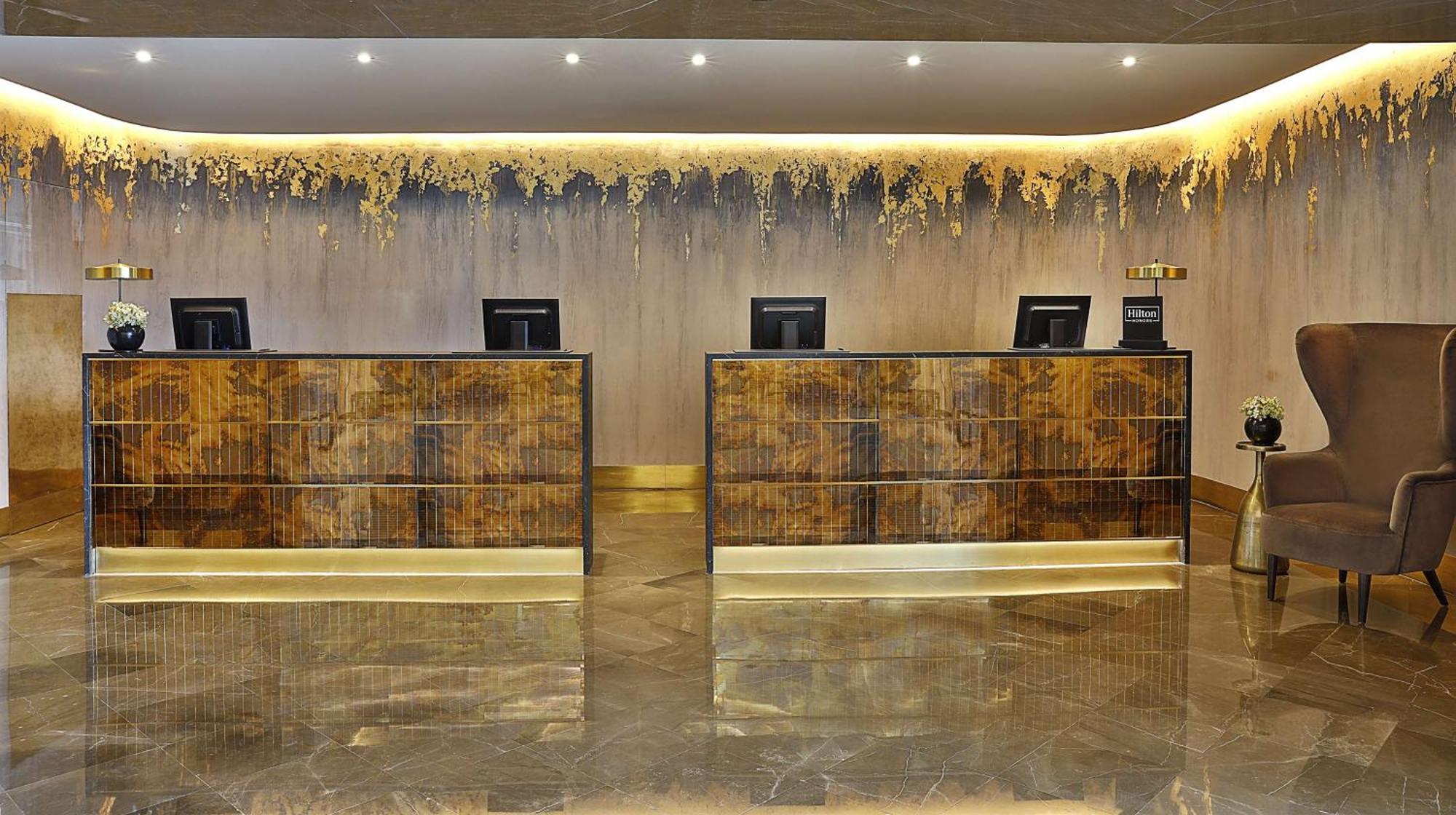 힐튼 탕헤르 시티 센터 호텔 앤 레지던스 외부 사진 The lobby of the hotel