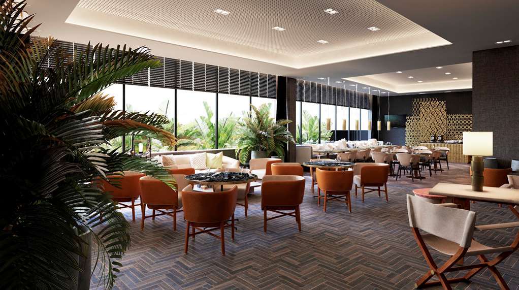 힐튼 탕헤르 시티 센터 호텔 앤 레지던스 레스토랑 사진 The interior of the restaurant